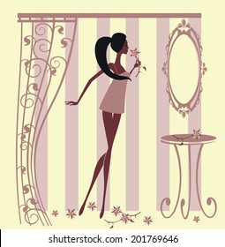  Woman looking at mirror