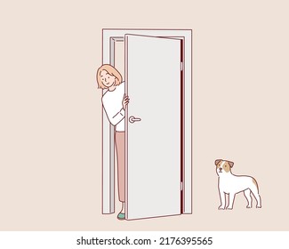 Woman looking out the door. Hand drawn style vector design illustrations.