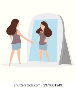 woman looking at reflection