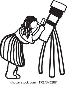 Woman looking through a telescope