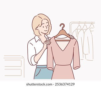 woman looks for clothes at fashion shop. Hand drawn style vector design illustrations.