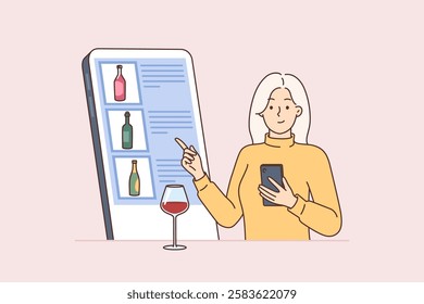 Woman looks through wine menu on smartphone, choosing favorite drink and standing at bar counter with wineglass. Girl recommends mobile application for ordering alcoholic drinks or wine