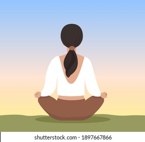 
Woman in lotus position practices mindfulness. Mindfulness is a secular meditation.