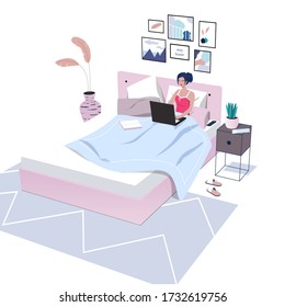 Woman lying in the bed,  studying or working at home. Online learning concept. Enjoy self-isolation, stay in your cozy home. Scandinavian interior. Flat vector illustration.