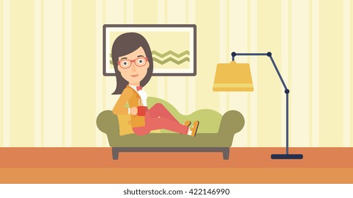 Woman lying with cup of tea.