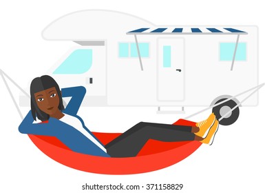 Woman lying in hammock.