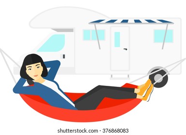 Woman lying in hammock.