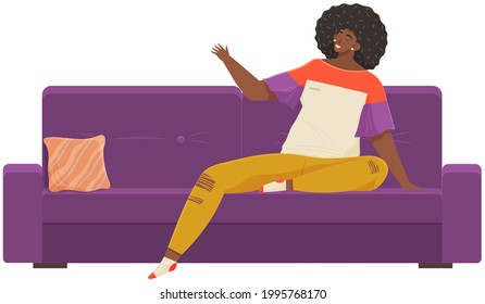 Woman lying on sofa in apartment. Happy young girl relaxing, dreaming. Rest on couch and think about something. Home leisure. Female lies on divan and smiles, enjoying time at home after work