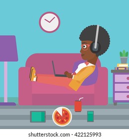 Woman lying on sofa with many gadgets.