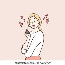 Woman making heart shape with two fingers. Hand drawn style vector design illustrations.