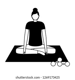 woman making yoga with mat and dumbbells
