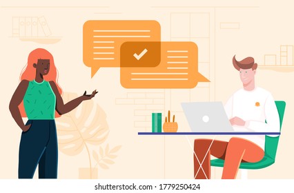 Woman and man colleagues talk about business and they agree on work. Social distancing and making your workplace COVID-secure.