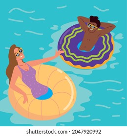 woman and man with floats in the pool
