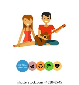 Woman and man with guitar