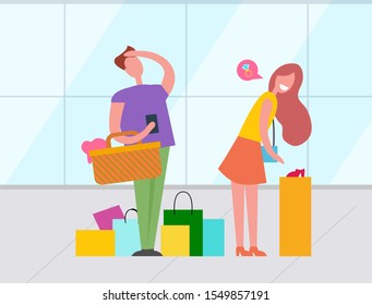 Woman and man with many colorfur paper bags shopping in department store, couple buying things in shop together. Girl looking at shoes and thinking about ring