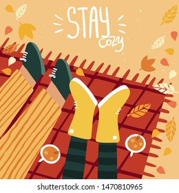 Woman and man on a picnic in fall and lettering stay cozy. Happy cute couple on autumn background with leaves and trees. Illustration is for your card, poster, flyer.