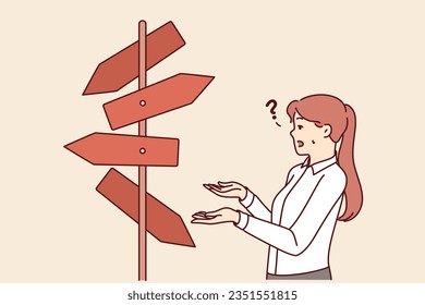 Woman manager makes difficult choice, standing near road sign with many options. Businesswoman or clerc is embarrassed because of difficult choice when drawing up business plan for company.