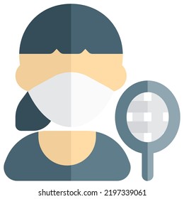 Woman with mask playing badminton as profession.
