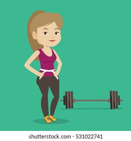 Woman measuring her waistline with a tape. Woman measuring with tape the waistline. Happy woman with centimeter on a waistline standing near a barbell. Vector flat design illustration. Square layout.