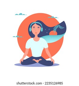woman meditating. listening to the sounds of nature on headphones. meditation, yoga, relaxation