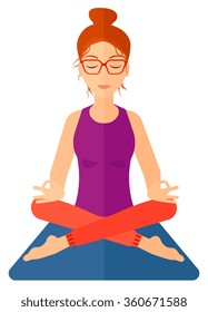 Woman meditating in lotus pose.