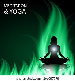 woman meditation on dark green abstract fire background. yoga.