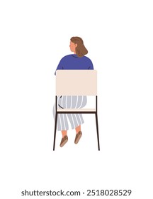 A woman with medium-length brown hair is sitting on a chair, facing away. She wears a blue top, striped pants, and brown shoes. Ideal for solitude, reflection, casual fashion, relaxation, and