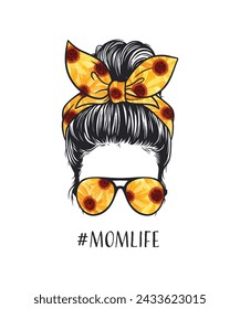 Woman with messy bun, headband, and sunflower sunglasses.