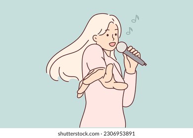 Woman with microphone sings in karaoke enjoying cool music party and stretching hands to screen. Girl singer performs standing on stage or performing songs to popular pop music in karaoke