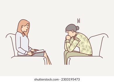 Woman military soldier with psychologist helping to get rid of psychological problems received in army. Girl in military uniform sits in front of psychologist treating post-traumatic disorder