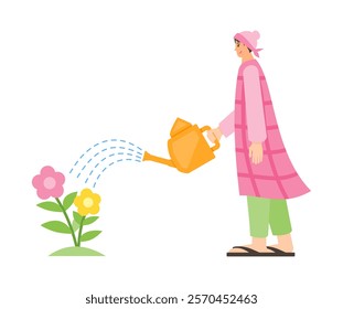 Woman or mother watering flower plants using watering can