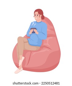 Woman with mug sitting on bean bag semi flat color vector character. Break time. Editable figure. Full body person on white. Simple cartoon style illustration for web graphic design and animation