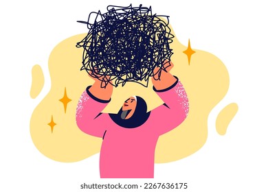 Woman with Muslim headscarf raises ball of tangled threads symbolizing intolerance and discrimination. Positive girl in Islamic headdress wishes to get rid of intolerance on religious basis 