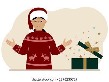A woman near an open Christmas or New Year's gift. Gift box for winter holidays.