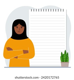 A woman next to a large notepad or large notebook. The concept of filling a notebook or notepad, writing notes, time management, planning.