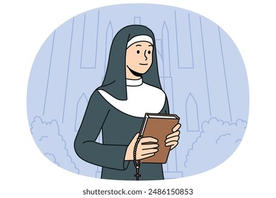 Woman nun with bible stands near church calling to visit christian shrines and study gospel or religious prayers. Catholic nun in white and black cassock holds cross for traditional orthodox rituals.