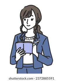 Woman in office casual outfit taking notes