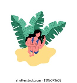 A woman on the beach uses a smartphone. Vector illustration in flat style.