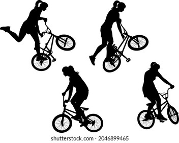 woman on BMX (bicycle motocross)  silhouettes