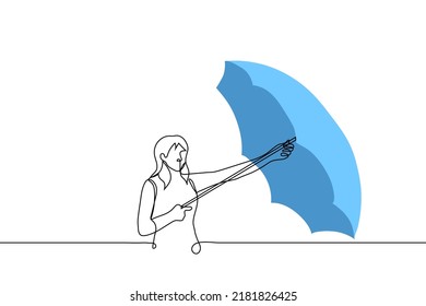 woman opened blue umbrella - one line drawing vector. concept rainy weather