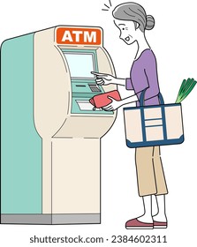 The woman operating the ATM isolated on white background