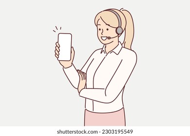 Woman operator works in support service and uses headset for call center advising customers. Businesswoman stands with phone in hands and does work of call center employee or sales agent