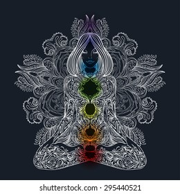 Woman ornate silhouette sitting in lotus pose. Meditation, aura and chakras. Vector illustration.