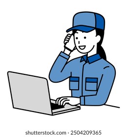 Woman in overalls working on a laptop making a phone call
