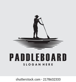 Woman in Paddle board silhouette logo vector design