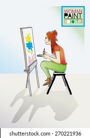 woman is painting colorful picture