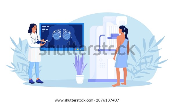 Woman patient getting breast screening test,\
mammography on x-ray machine. Doctor oncologist diagnose oncology,\
breast cancer. Mammogram Fluorography on screen. Healthcare and\
medical examination
