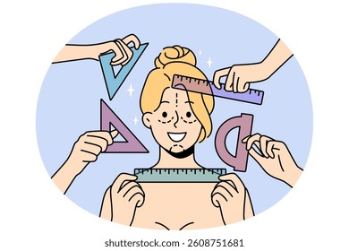 Woman patient of plastic surgery clinic with lines on face and rulers in hands of doctors. Girl is expecting plastic surgery operation to rejuvenate and get rid of wrinkles or double chin