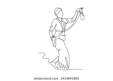 A woman performs a dance performance. Tradition one-line drawing