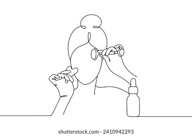 A woman performs a facial massage using a facial roller and a gua sha board. Tools for improving skin. Next to it is facial oil. Images produced without the use of any form of AI. 